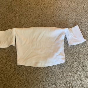 An off shoulder cropped tank top.